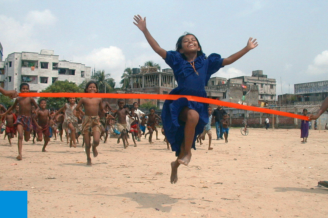 Girl running and crossing the finish line