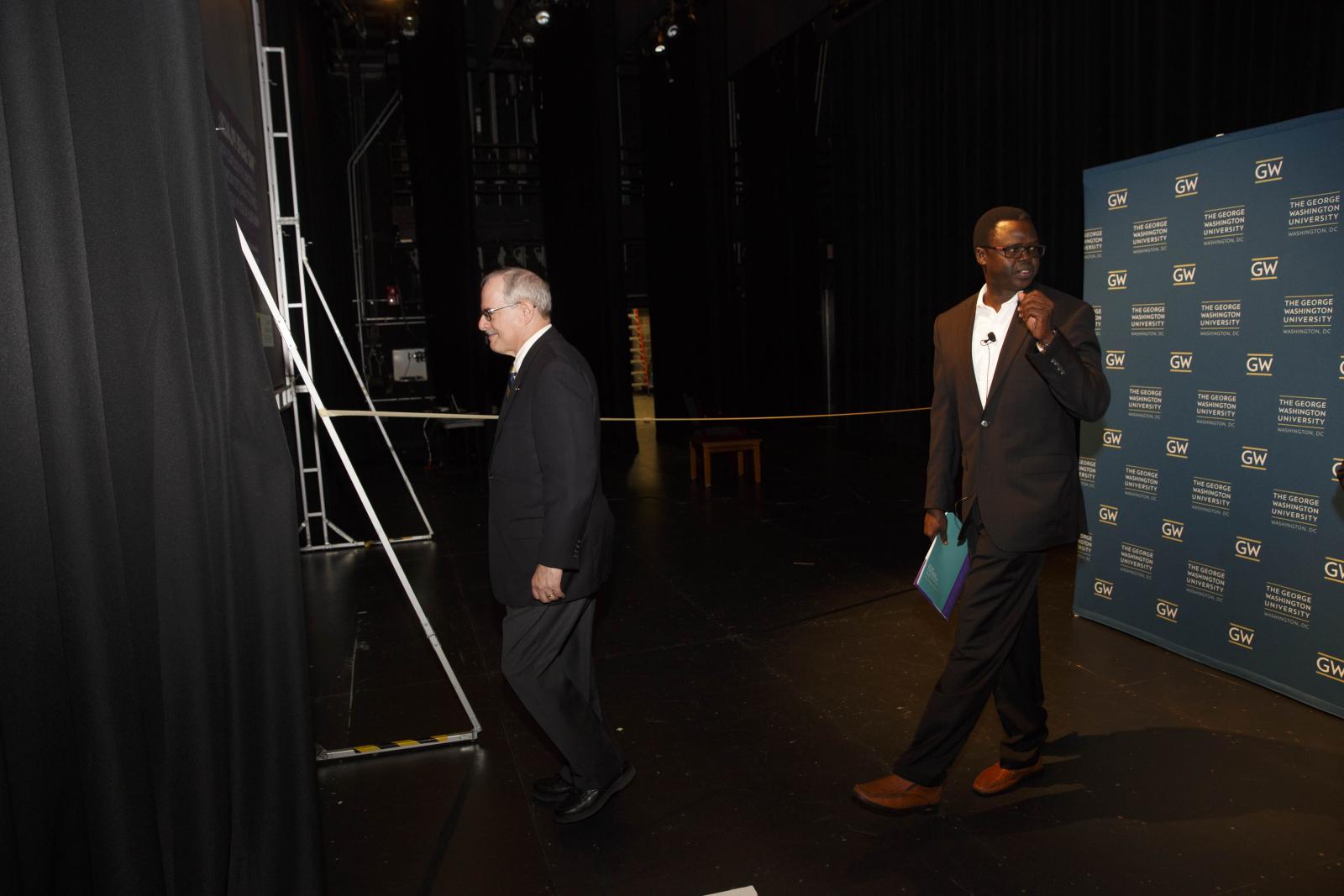 President LeBlanc and Valentino Deng walk on stage
